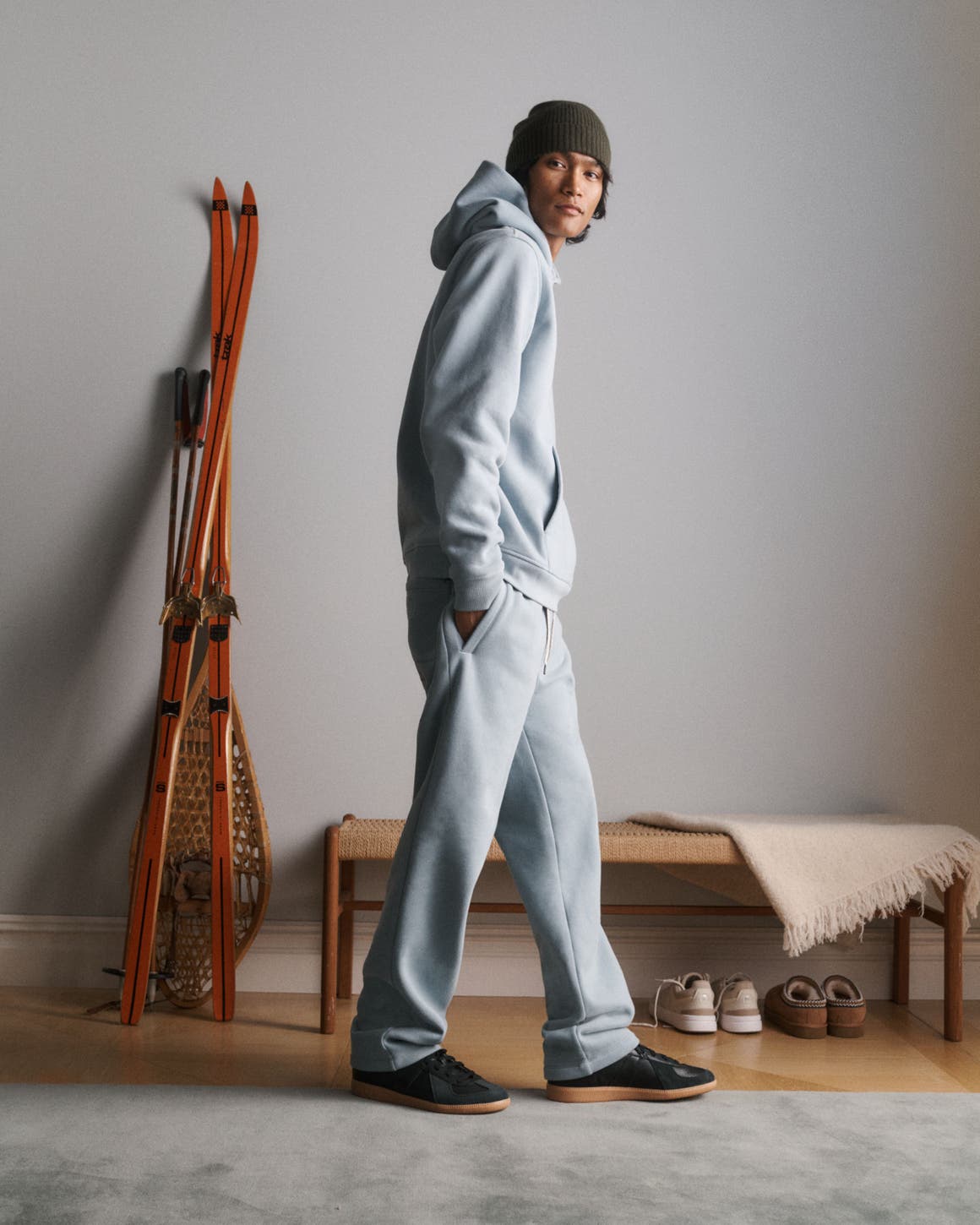 Image of man in grey sweat set.