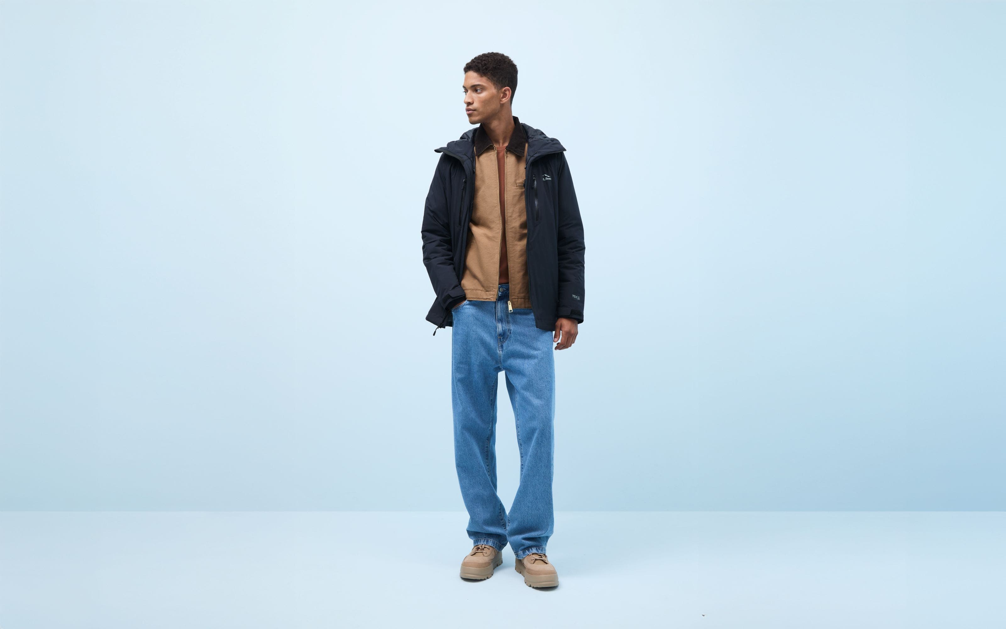 A man wearing relaxed jeans.