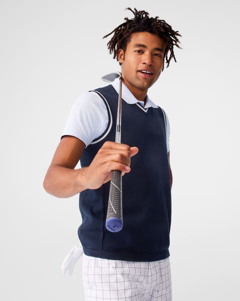 A man dressed in golf attire.