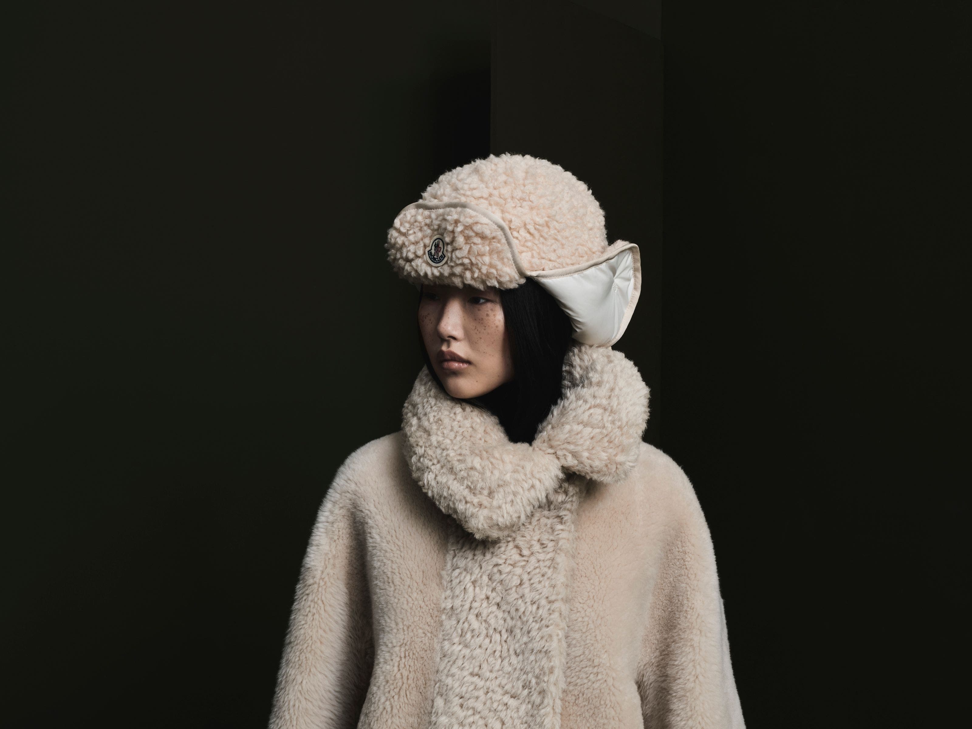 Model wearing a Moncler look.