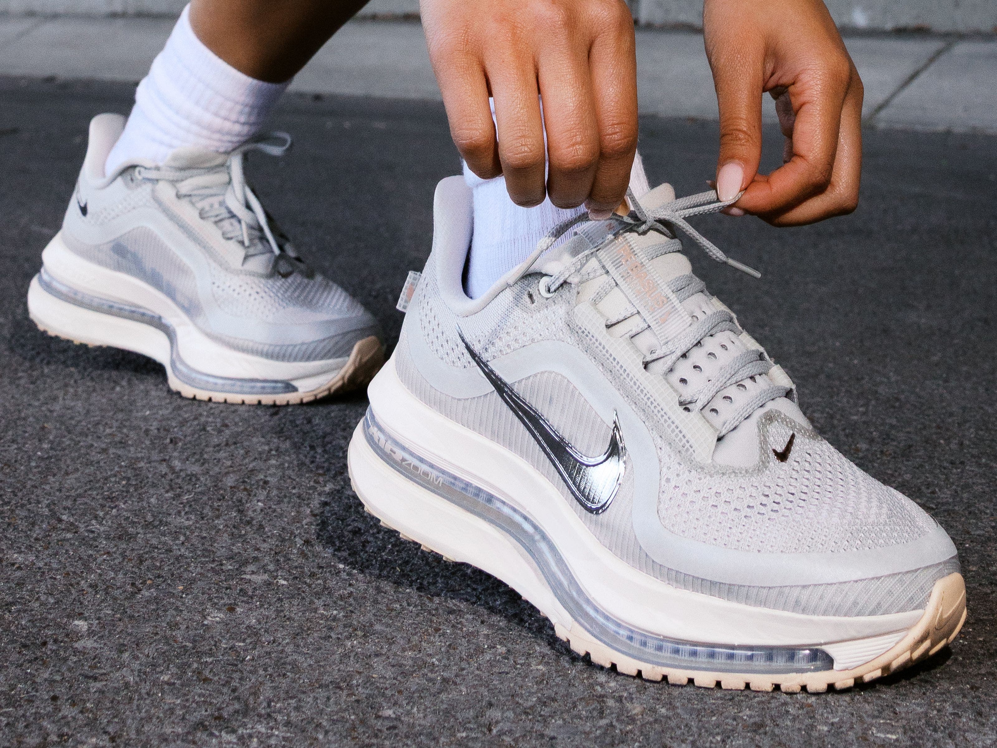 A person wearing Nike Pegasus Premium running shoes.