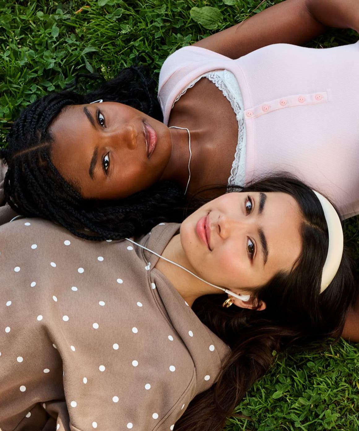 Two women wearing casual back to campus outfits.