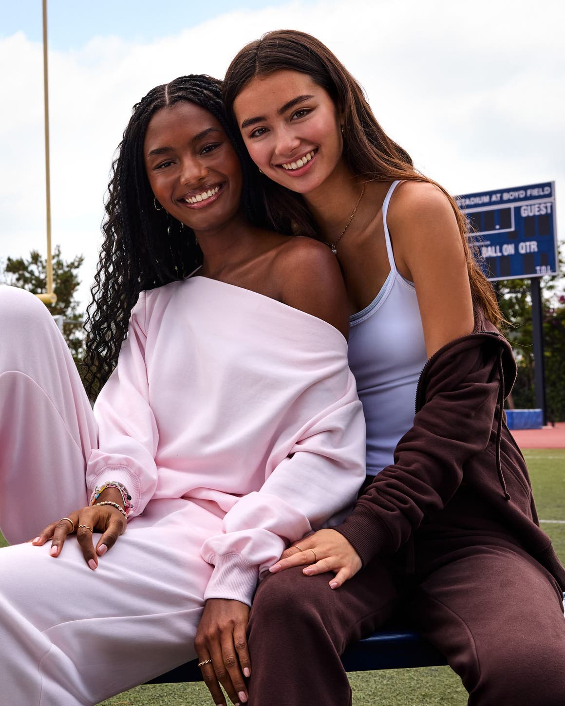 Two girls in sweatsuits.