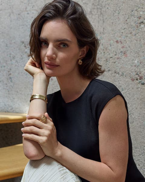 Woman wearing Nordstrom bracelet.