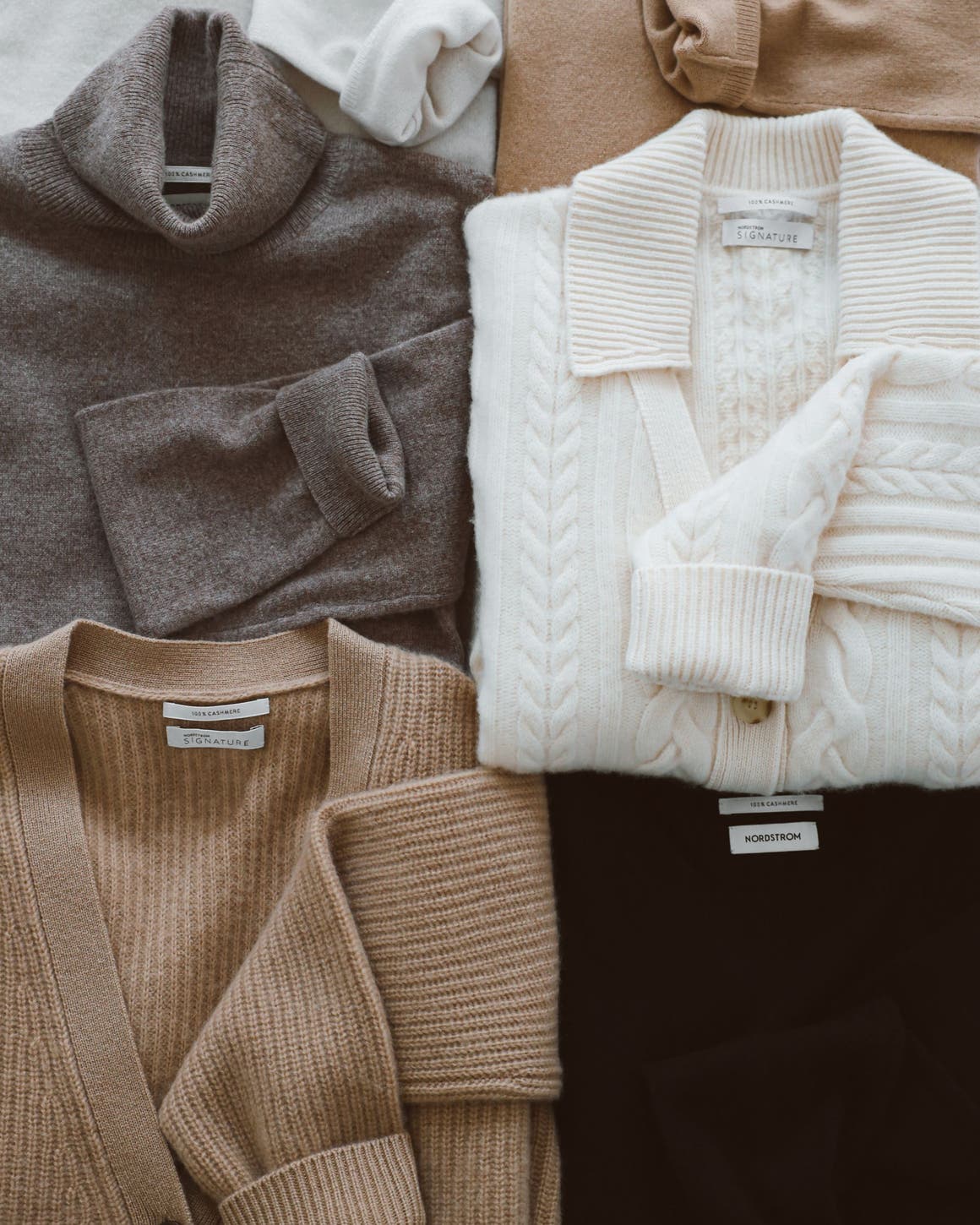 Assorted Nordstrom sweaters.