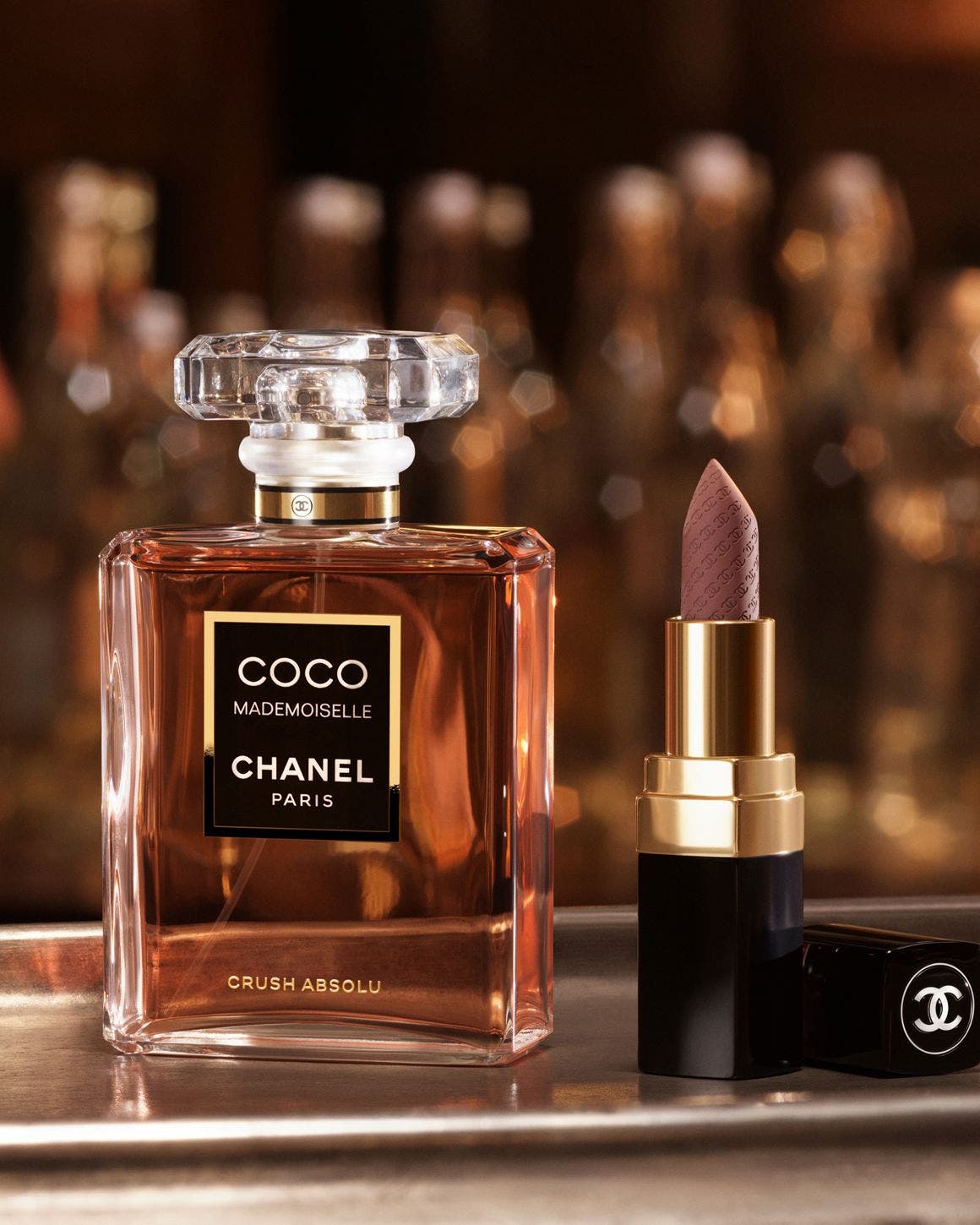 CHANEL fragrance and lipstick.