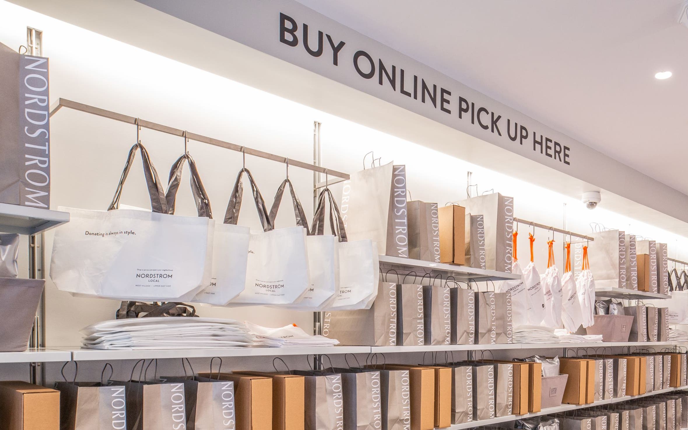 Shelves of Nordstrom shopping bags.