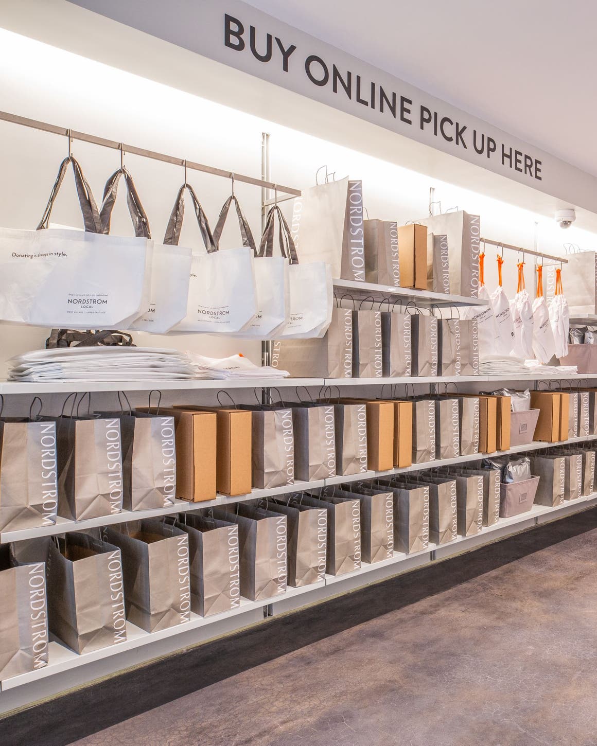 Shelves of Nordstrom shopping bags.
