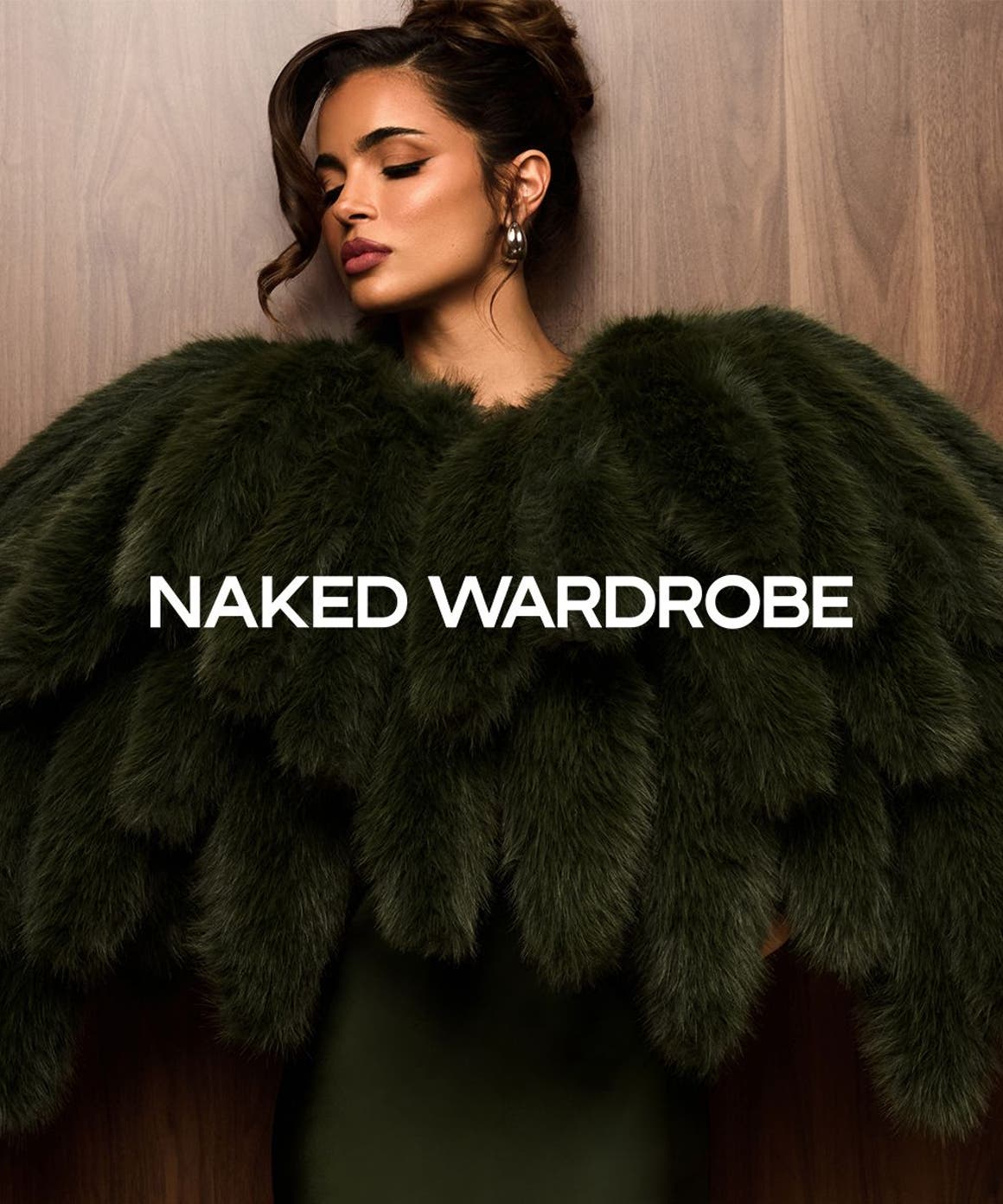 A woman wearing a faux-fur jacket.