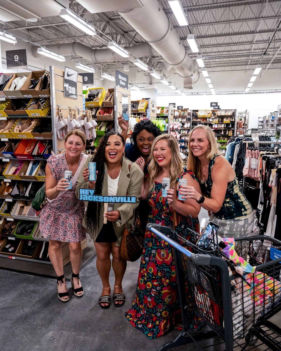 Customers at a pre-opening shopping party for a Nordstrom Rack store.
