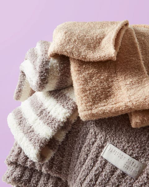 An assortment of soft blankets.