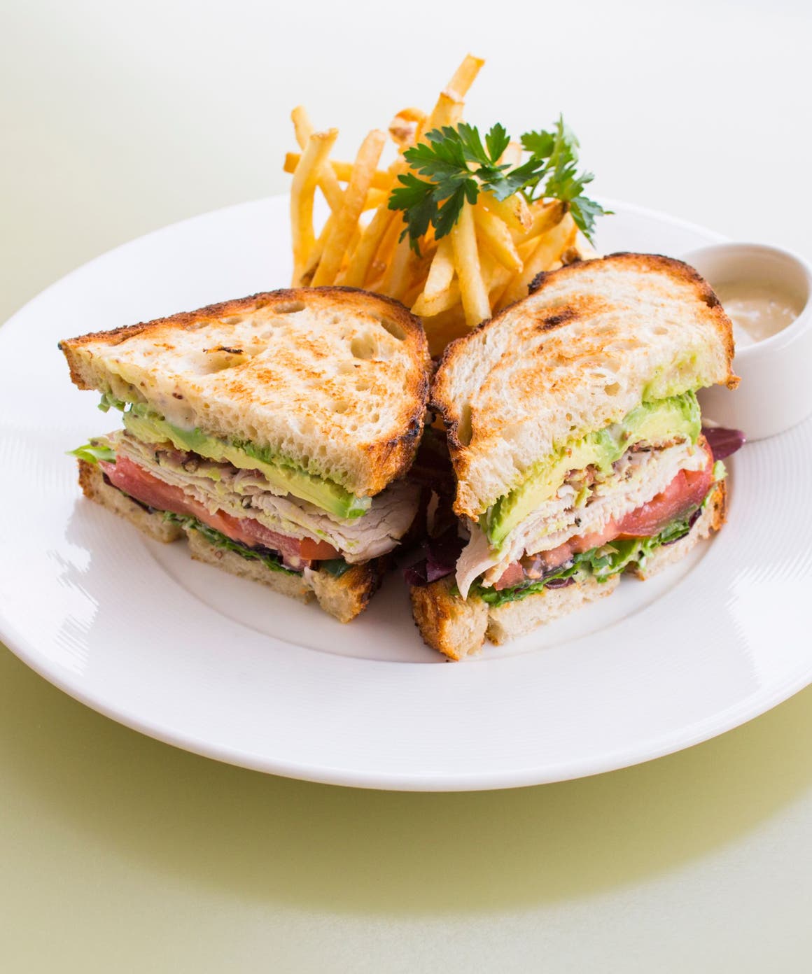 A club sandwich and fries from a Nordstrom restaurant.