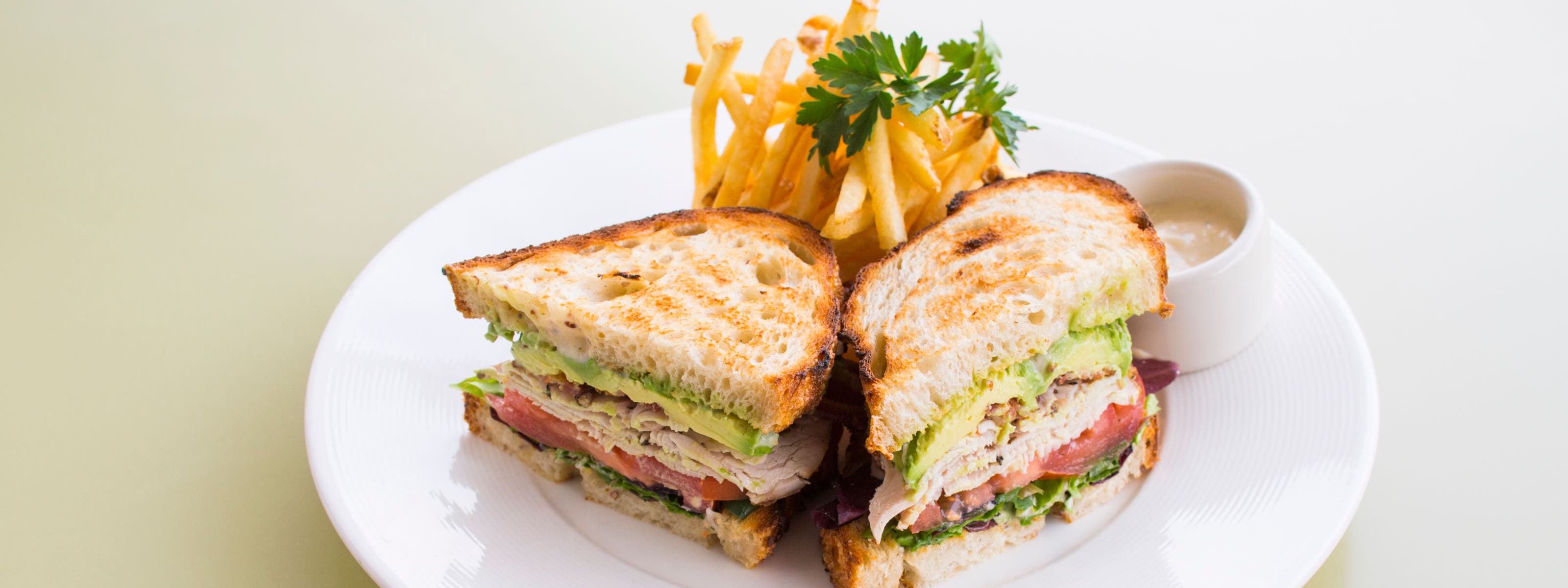 A club sandwich and fries from a Nordstrom restaurant.