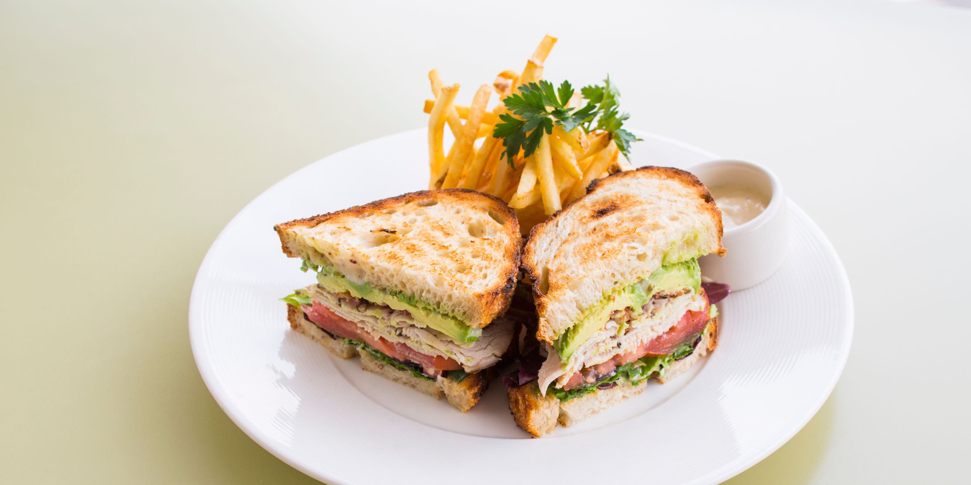 A club sandwich and fries from a Nordstrom restaurant.