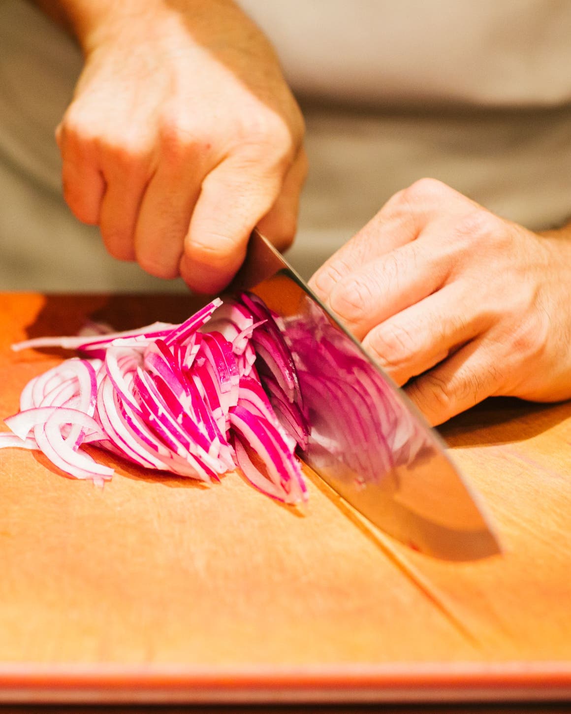 Chef slicing onions