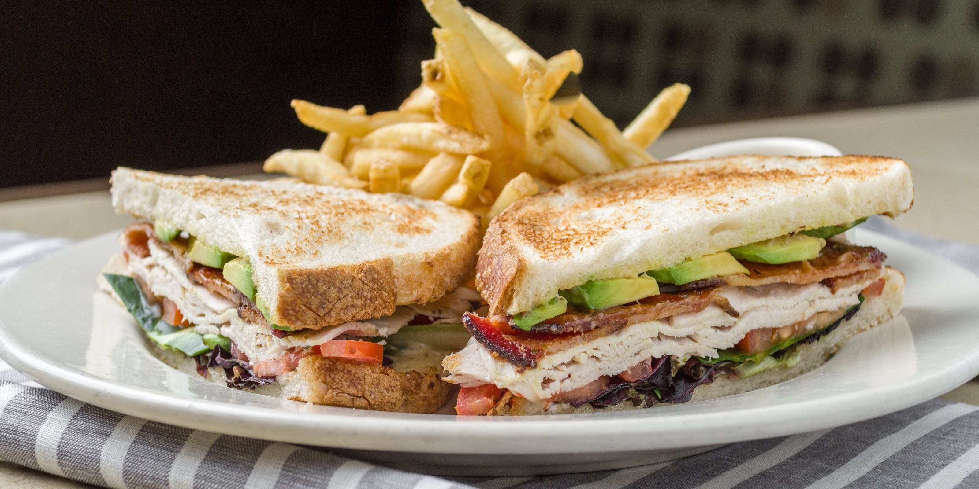 Cafe Bistro Turkey Avocado Club Sandwich.