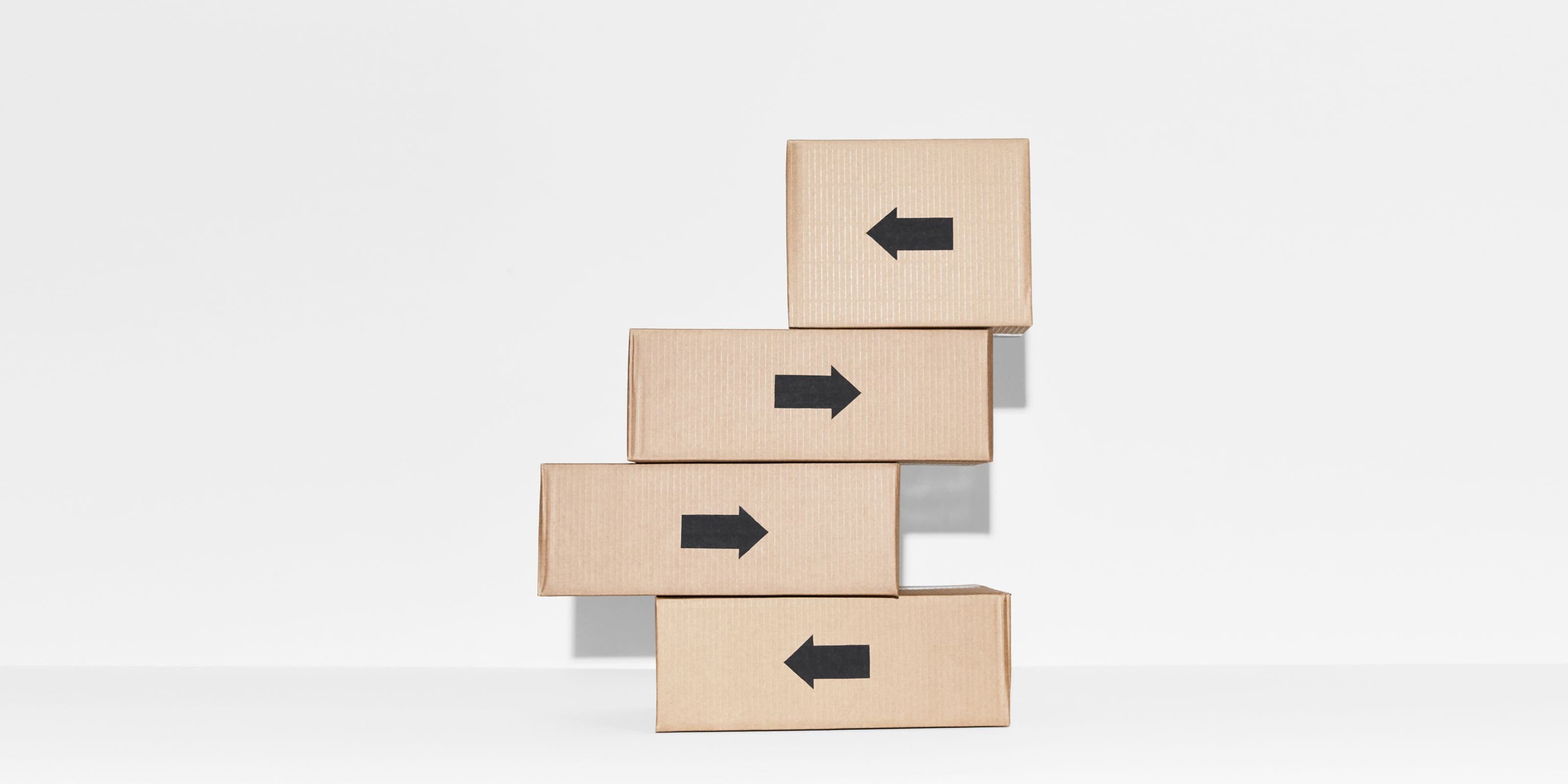 A stack of four Nordstrom shipping boxes.