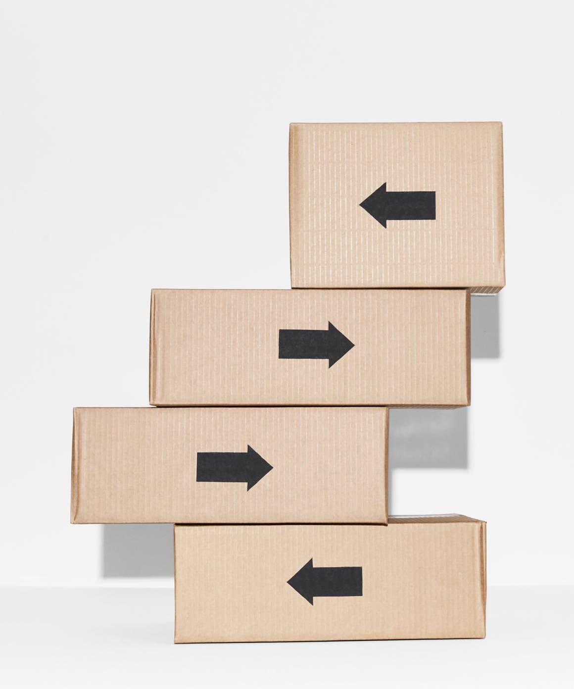 A stack of four Nordstrom shipping boxes.