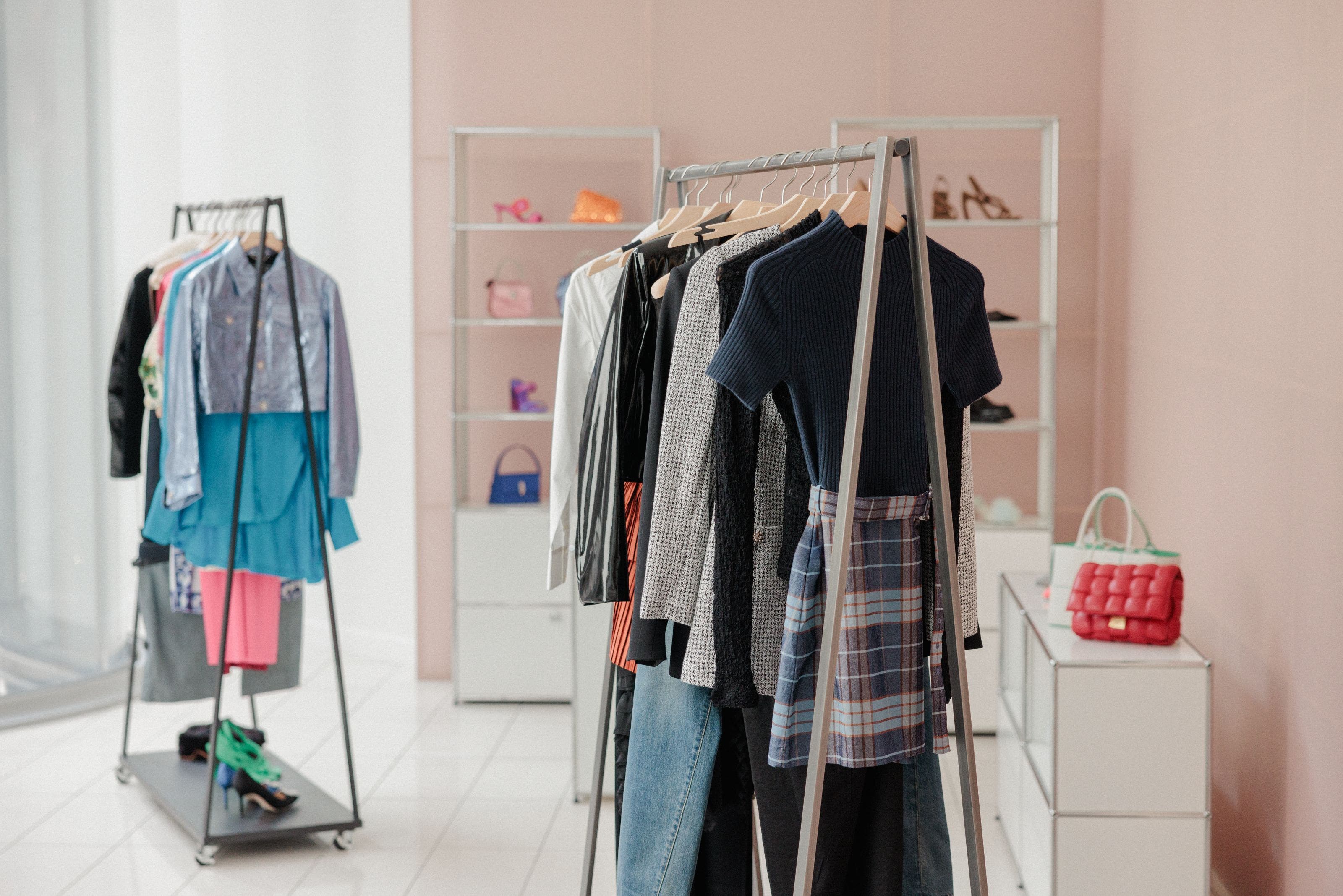 Racks and shelves with Nordstrom clothing, shoes and accessories.
