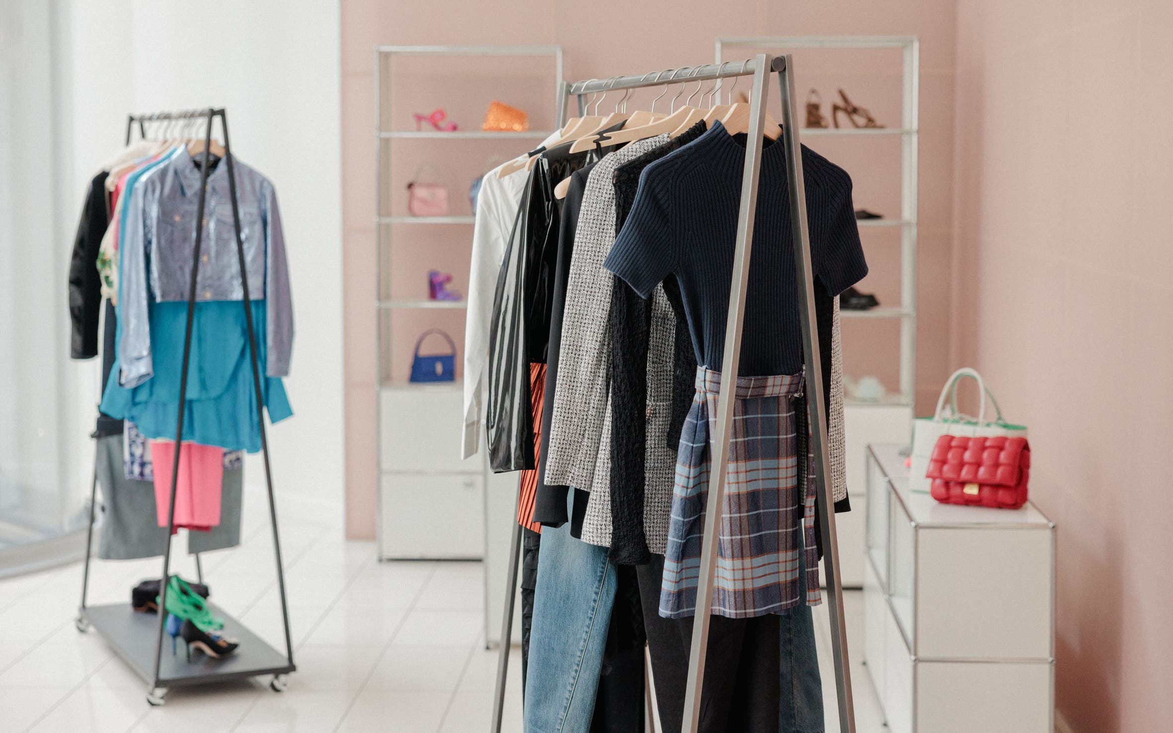 Racks and shelves with Nordstrom clothing, shoes and accessories.