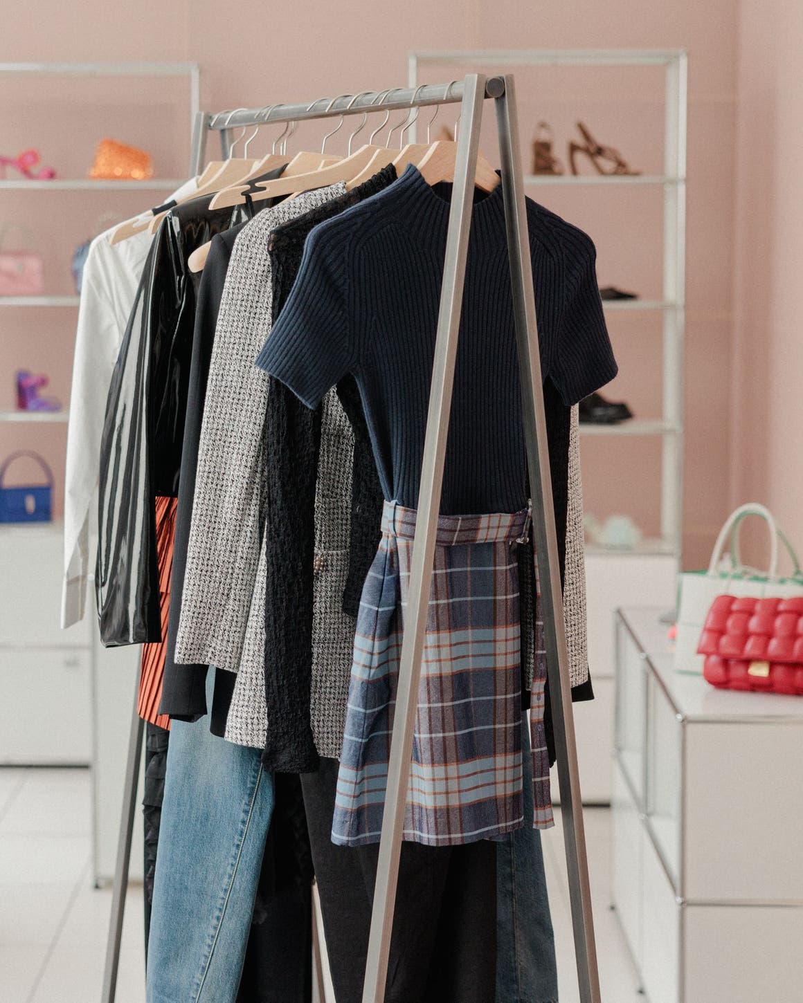 Racks and shelves with Nordstrom clothing, shoes and accessories.