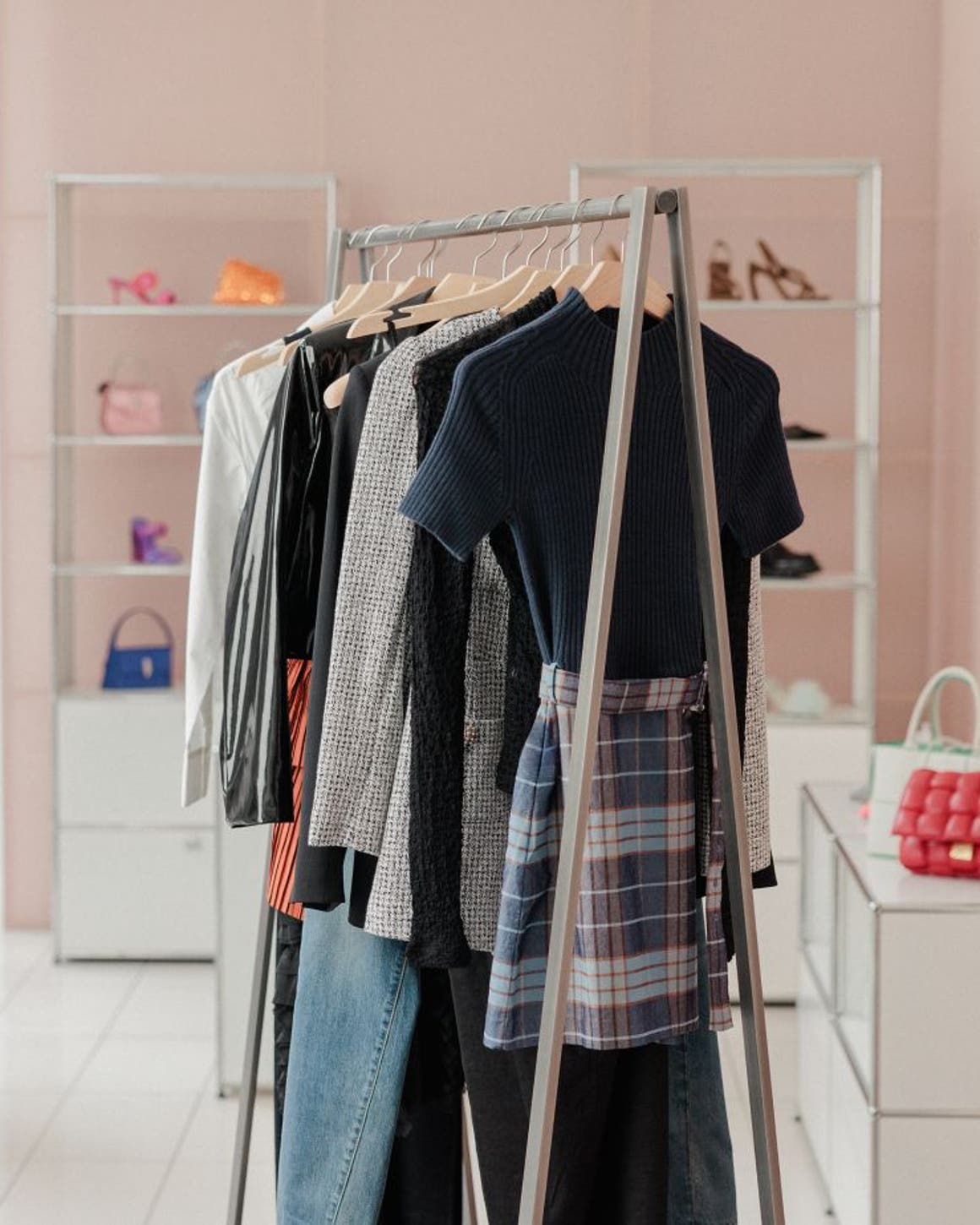 Clothing rack with accessories.