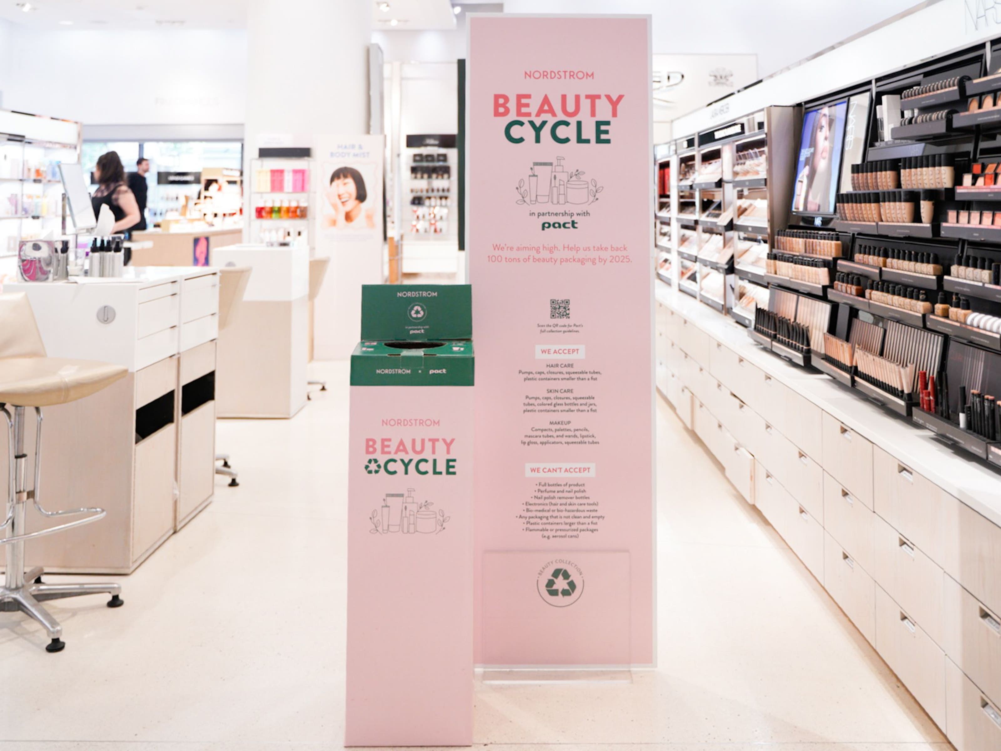 A BEAUTYCYCLE box for empty beauty and fragrance containers in a Nordstrom beauty department.
