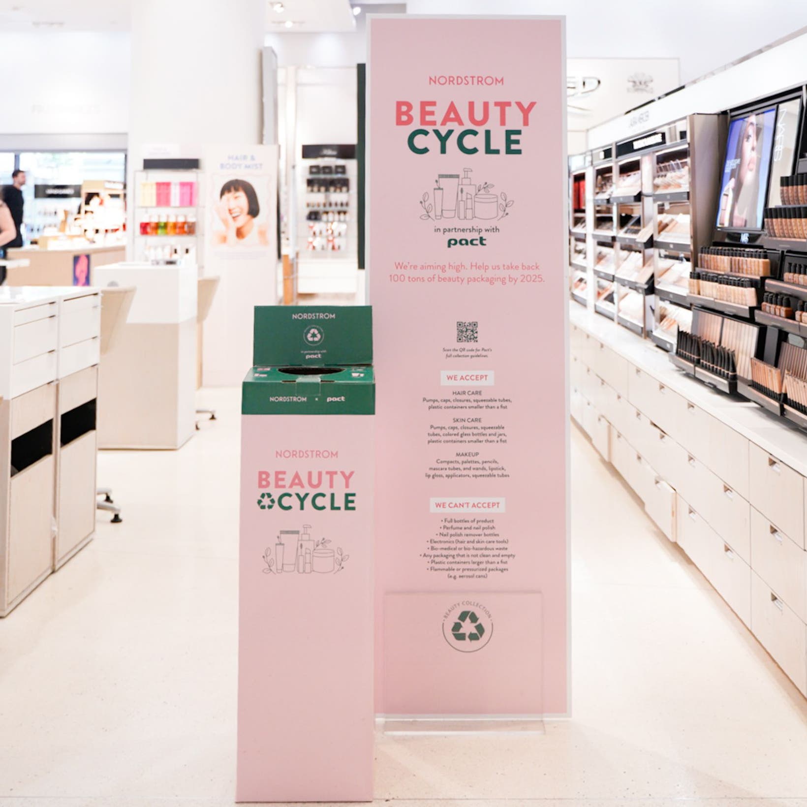 A BEAUTYCYCLE box for empty beauty and fragrance containers in a Nordstrom beauty department.