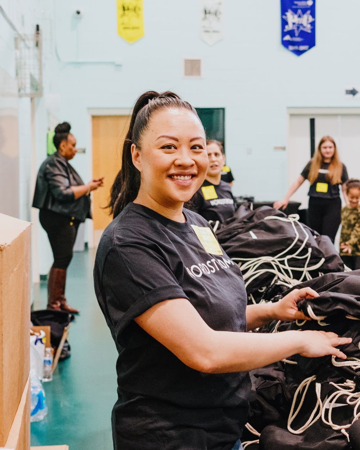 A Nordstrom employee at a volunteer event.