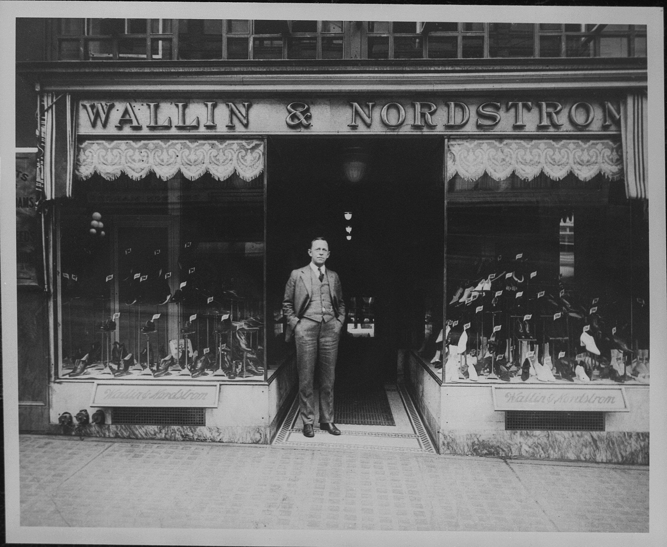 John W. Nordstrom in front of the Wallin & Nordstrom store.