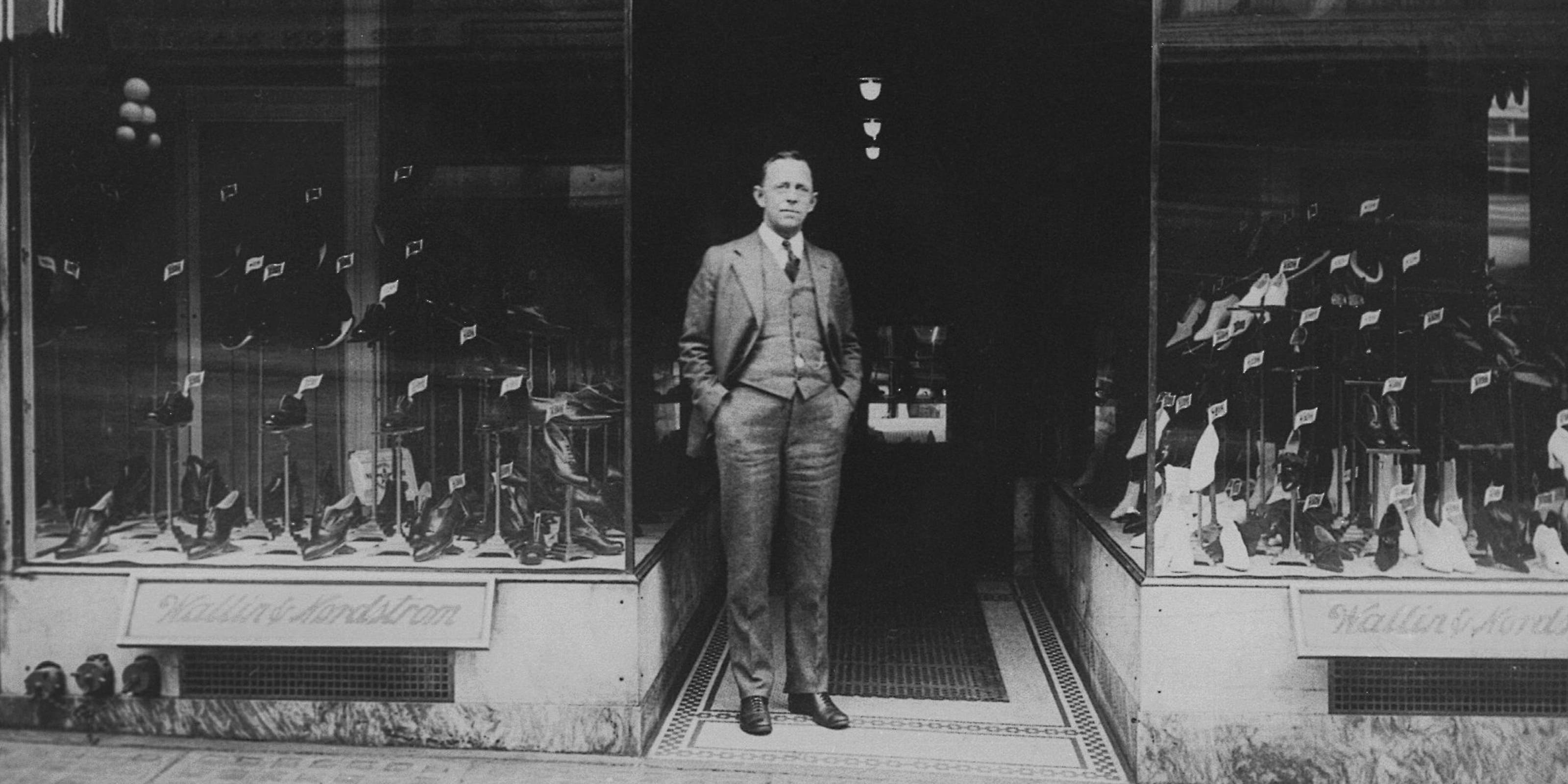 John W. Nordstrom in front of the Wallin & Nordstrom store.