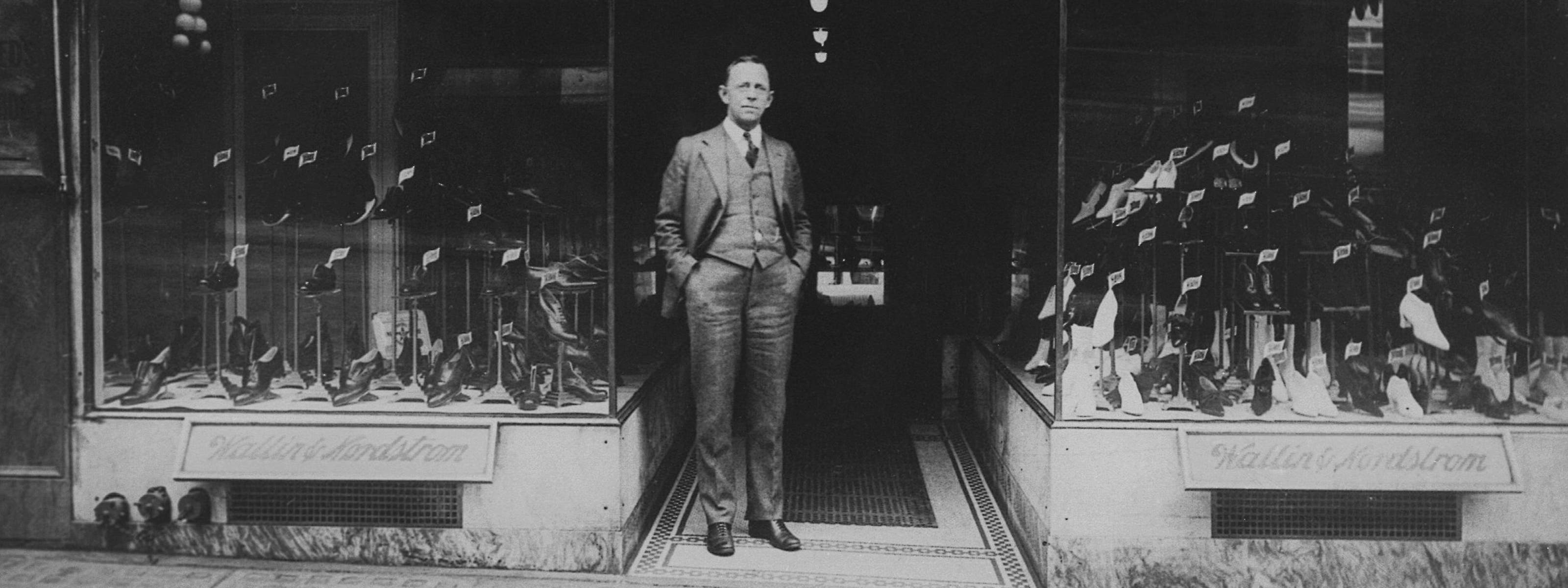 John W. Nordstrom in front of the Wallin & Nordstrom store.