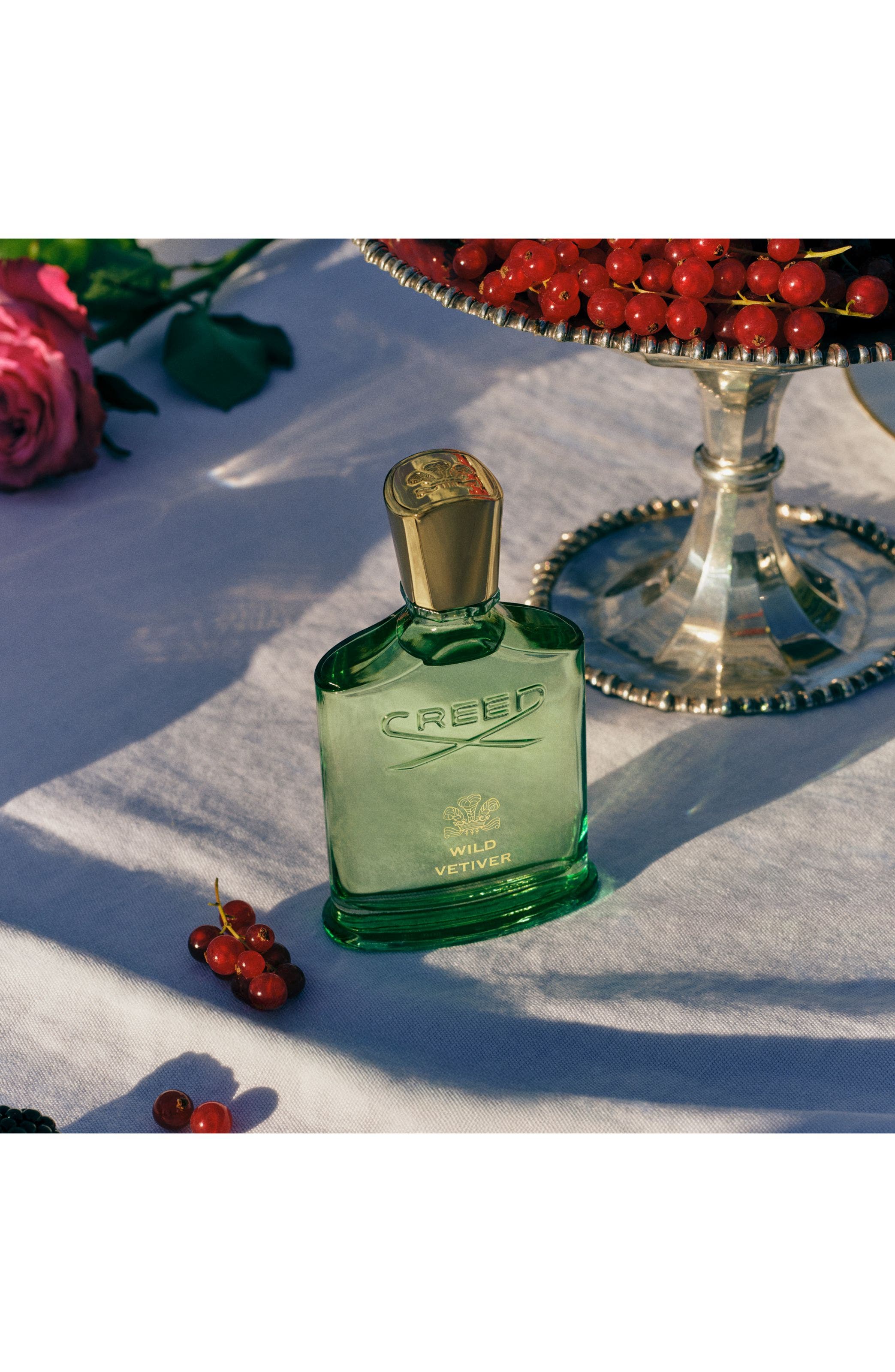 A bottle of Creed Wild Vetiver fragrance.