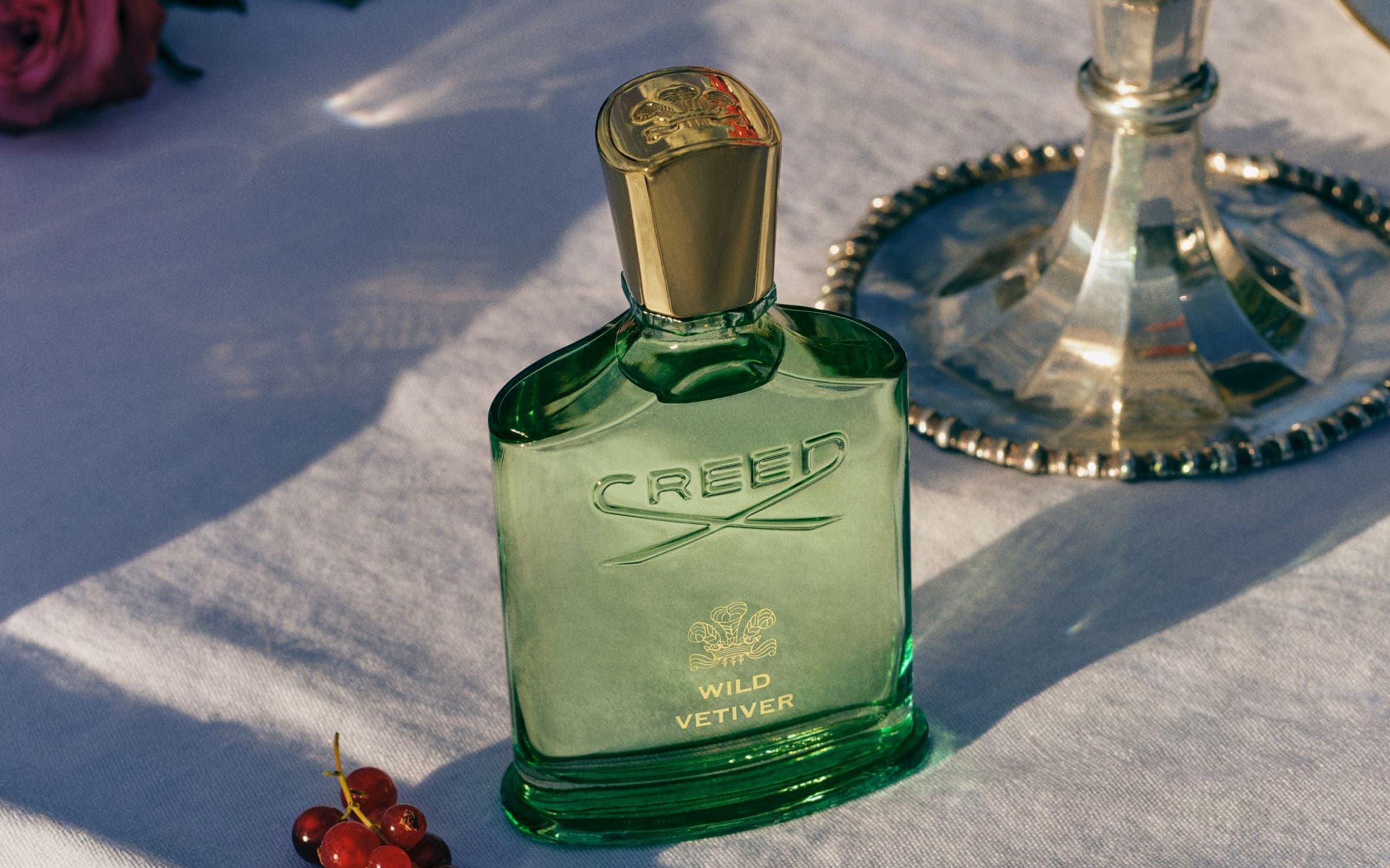 A bottle of Creed Wild Vetiver fragrance.