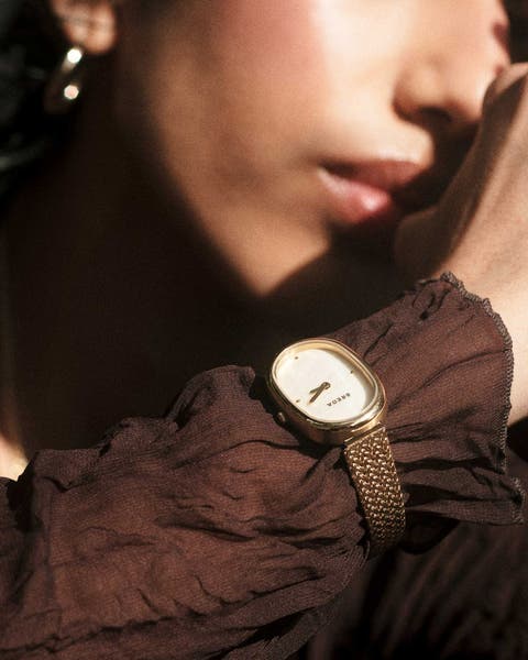 A woman wearing a watch.