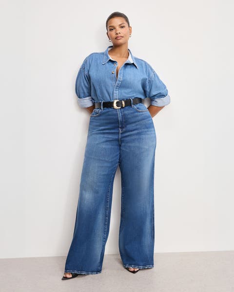 Woman wearing denim top and denim wide leg jeans.