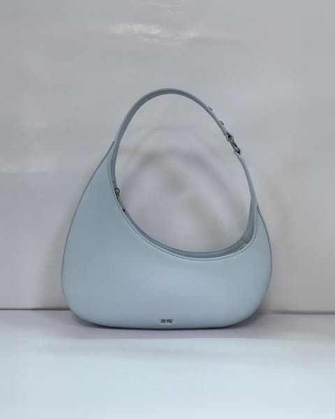 A faux leather shoulder bag.
