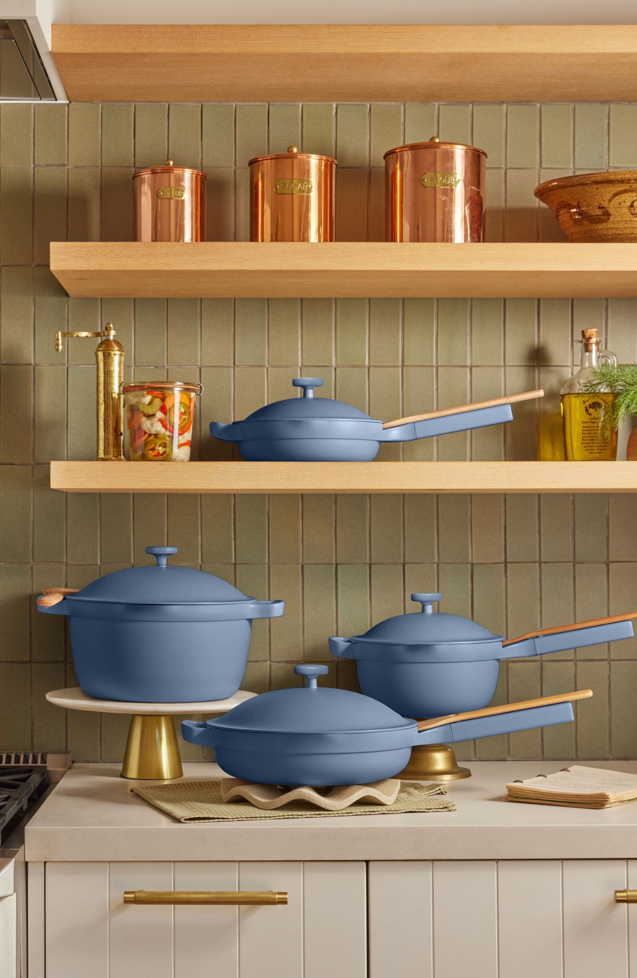 A collection of blue cookware from Our Place.