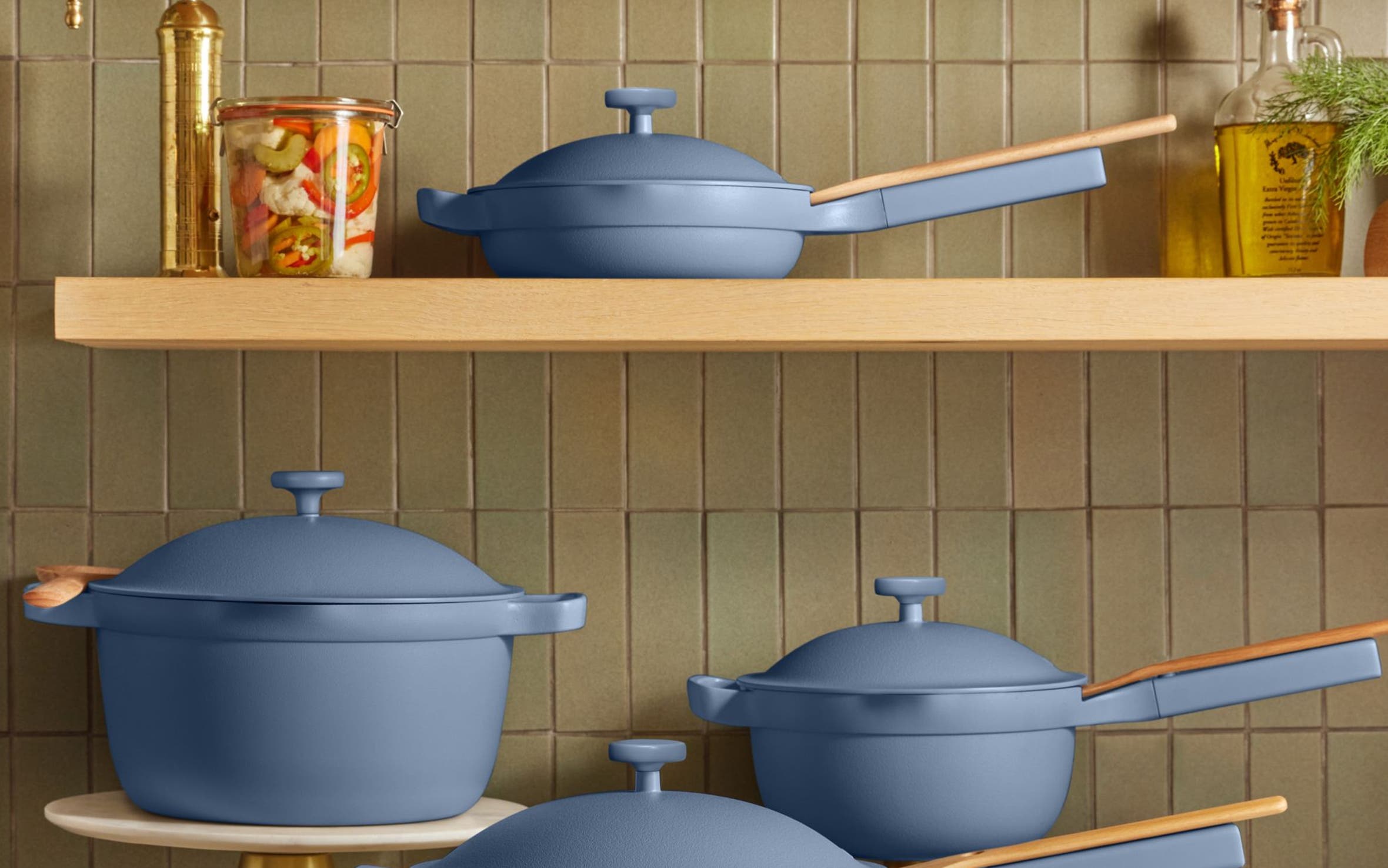 A collection of blue cookware from Our Place.