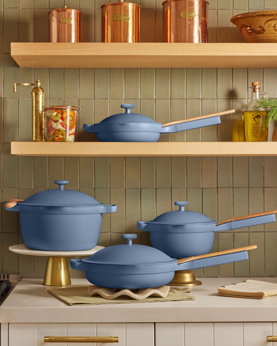 A collection of blue cookware from Our Place.