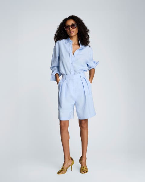 Light blue long shorts.