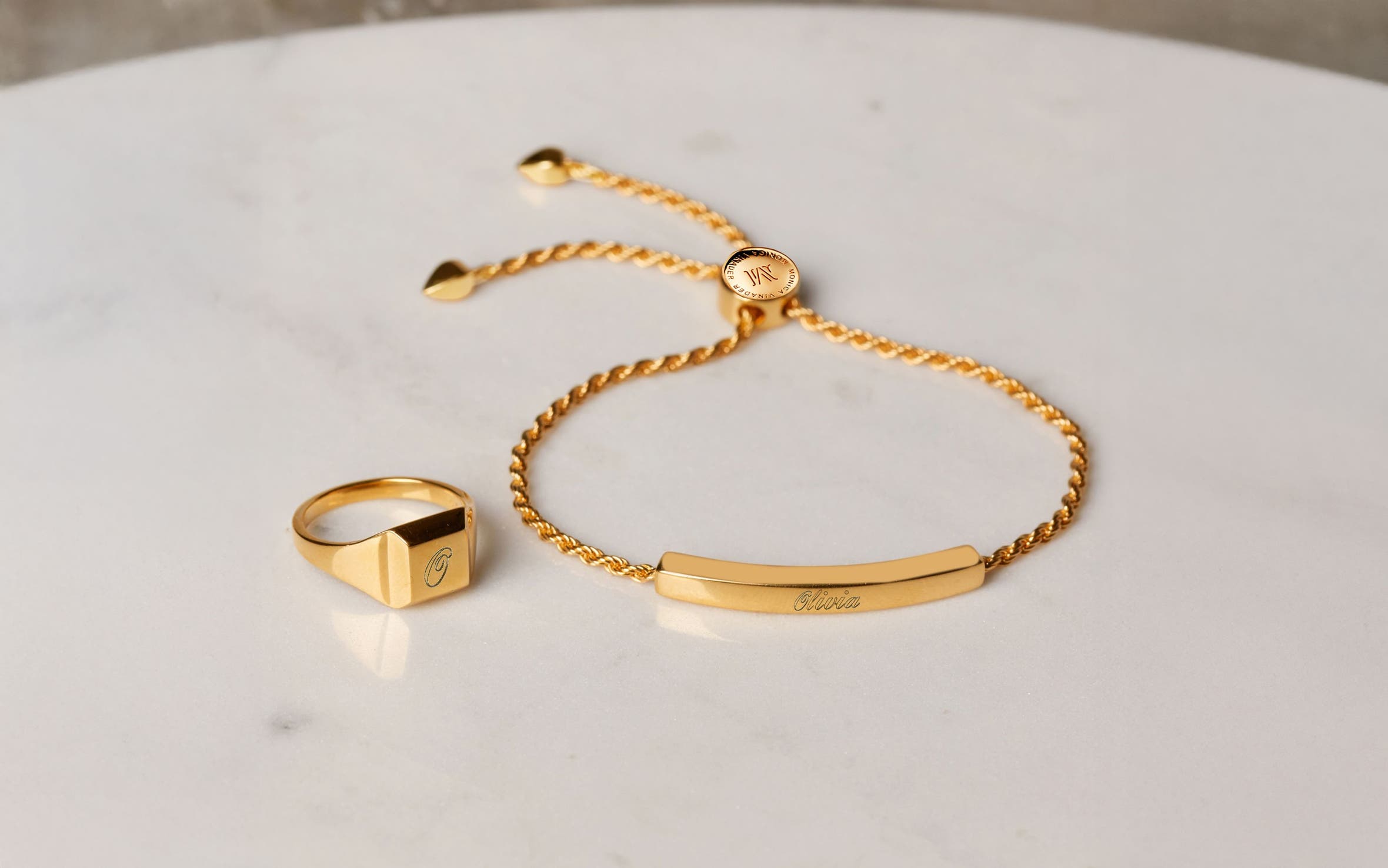 A gold ring and bracelet.