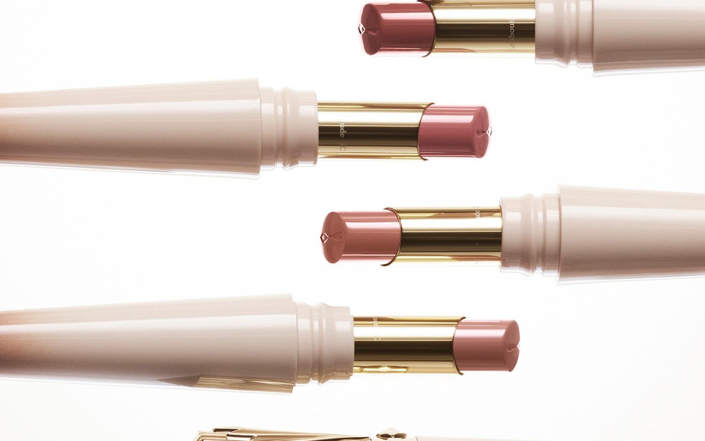 Tubes of Christian Louboutin lipstick.