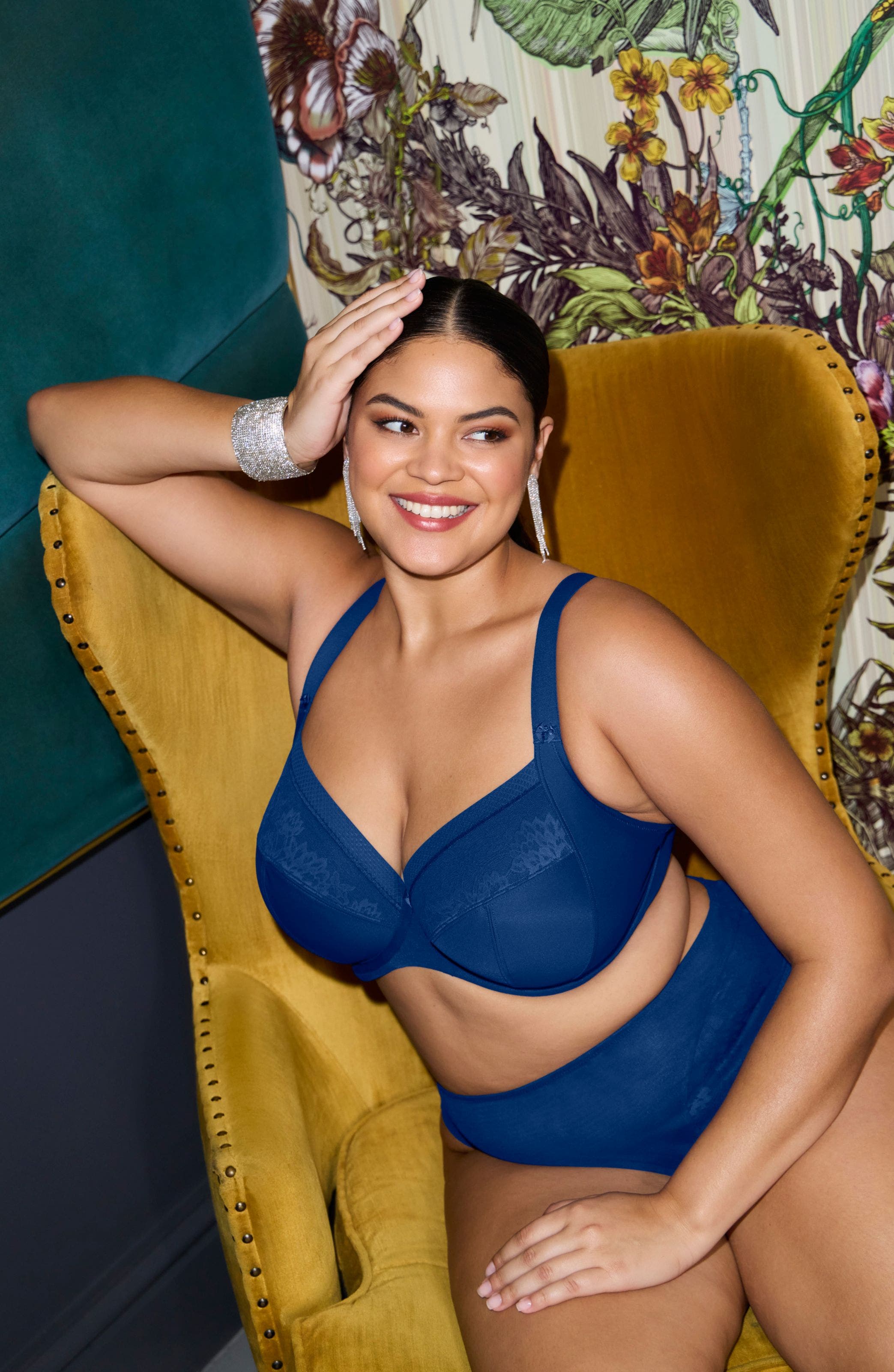 A woman wearing a blue bra.
