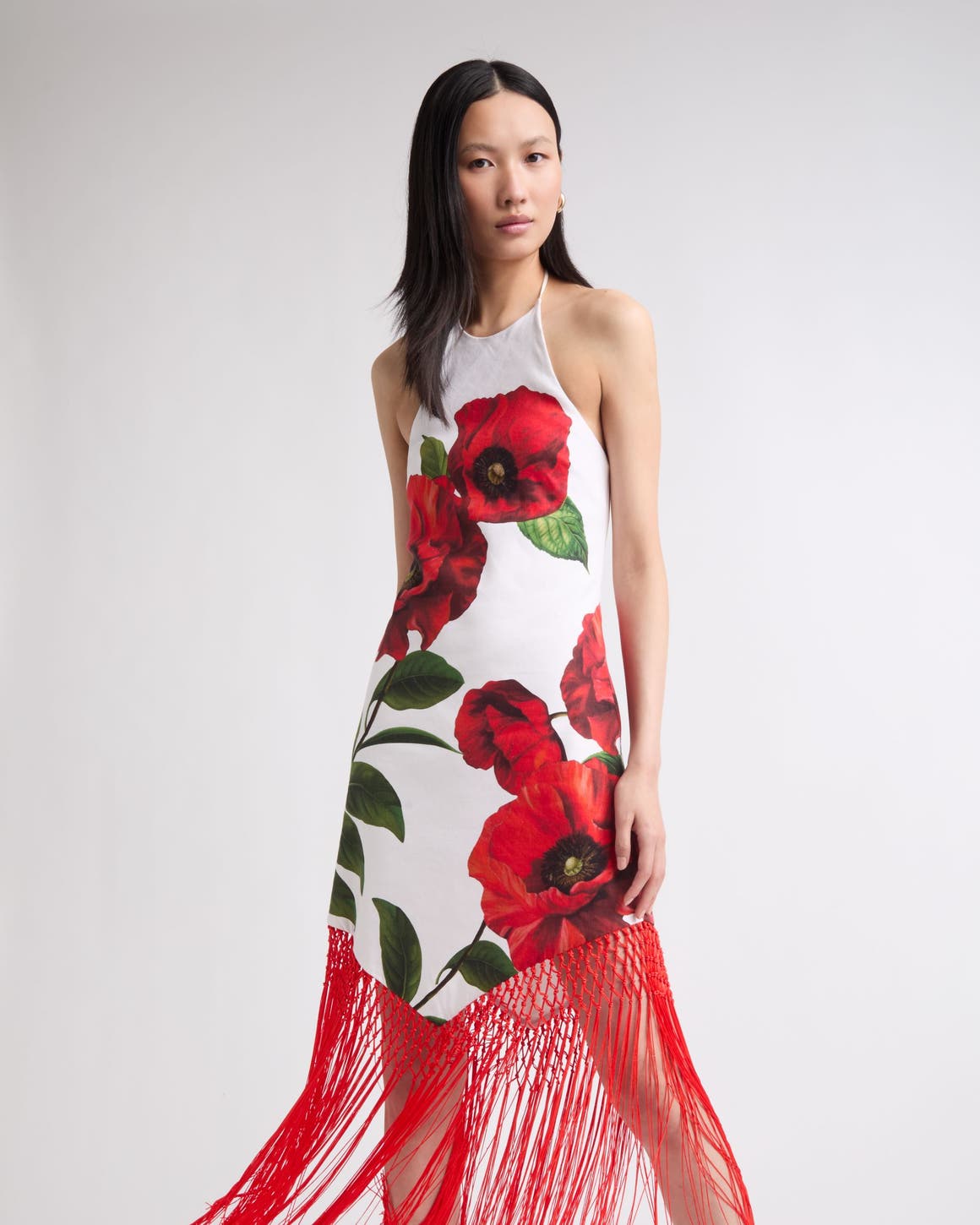 A woman wearing a cocktail dress.