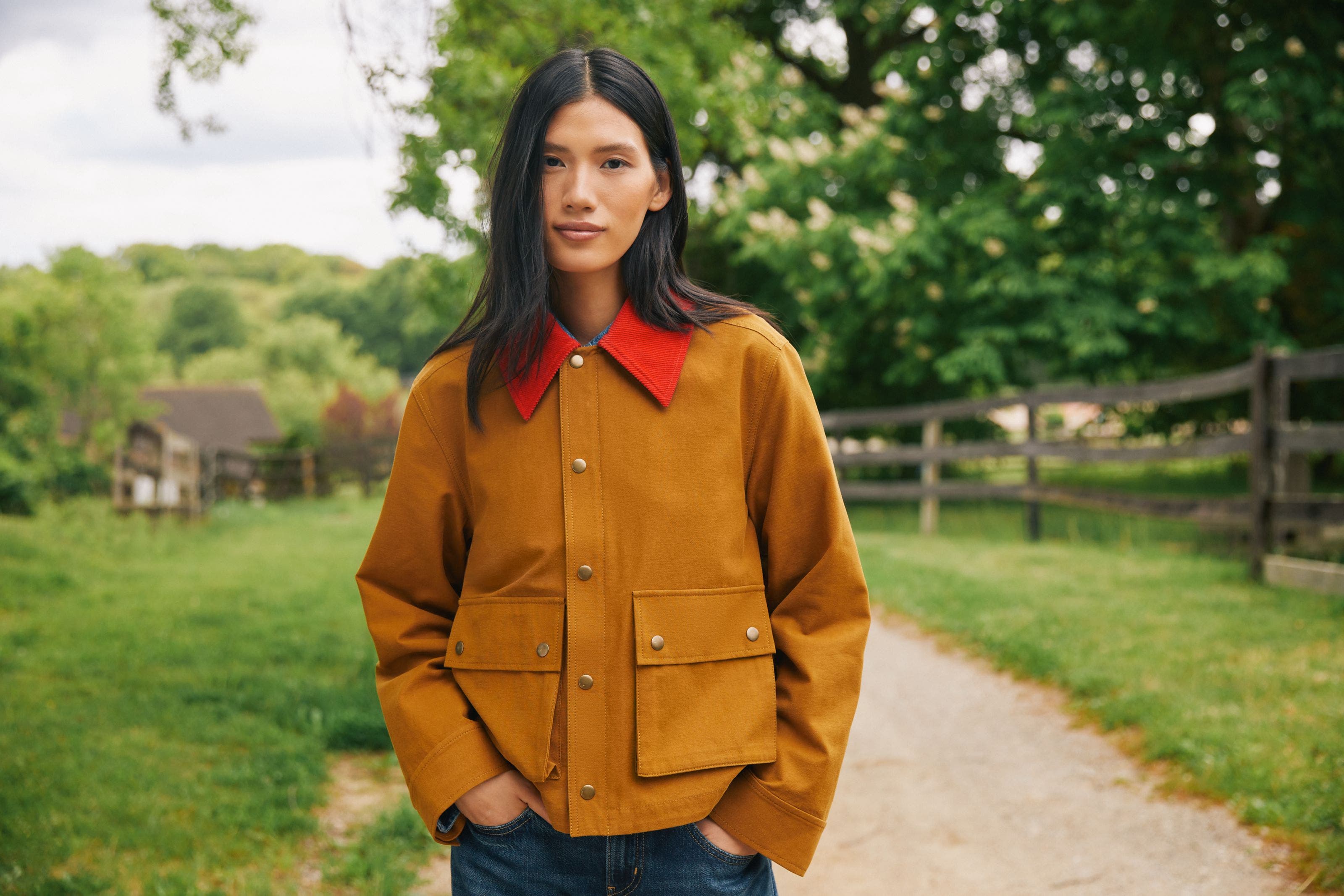 Woman wearing a utility jacket.