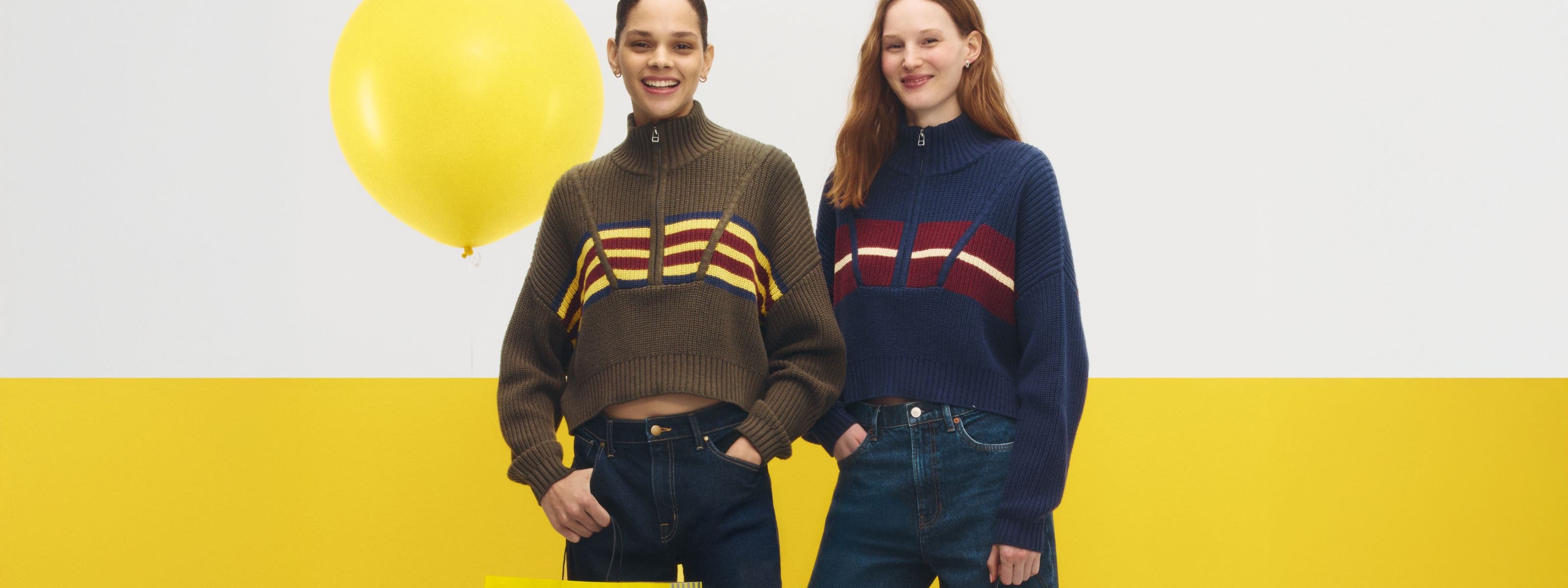 two women with Anniversary sale shopping bags