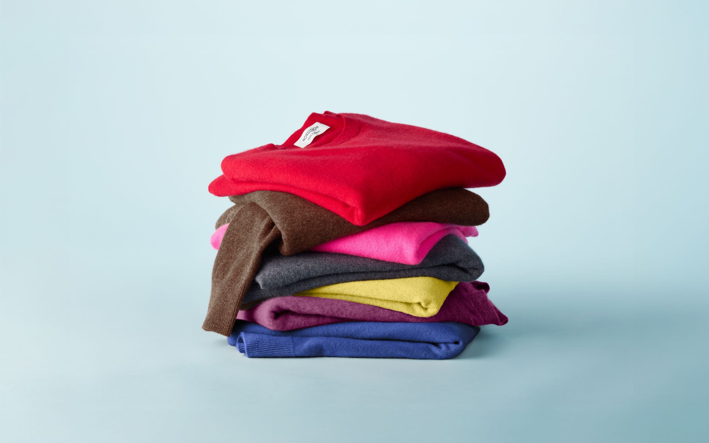 A stack of folded sweaters.