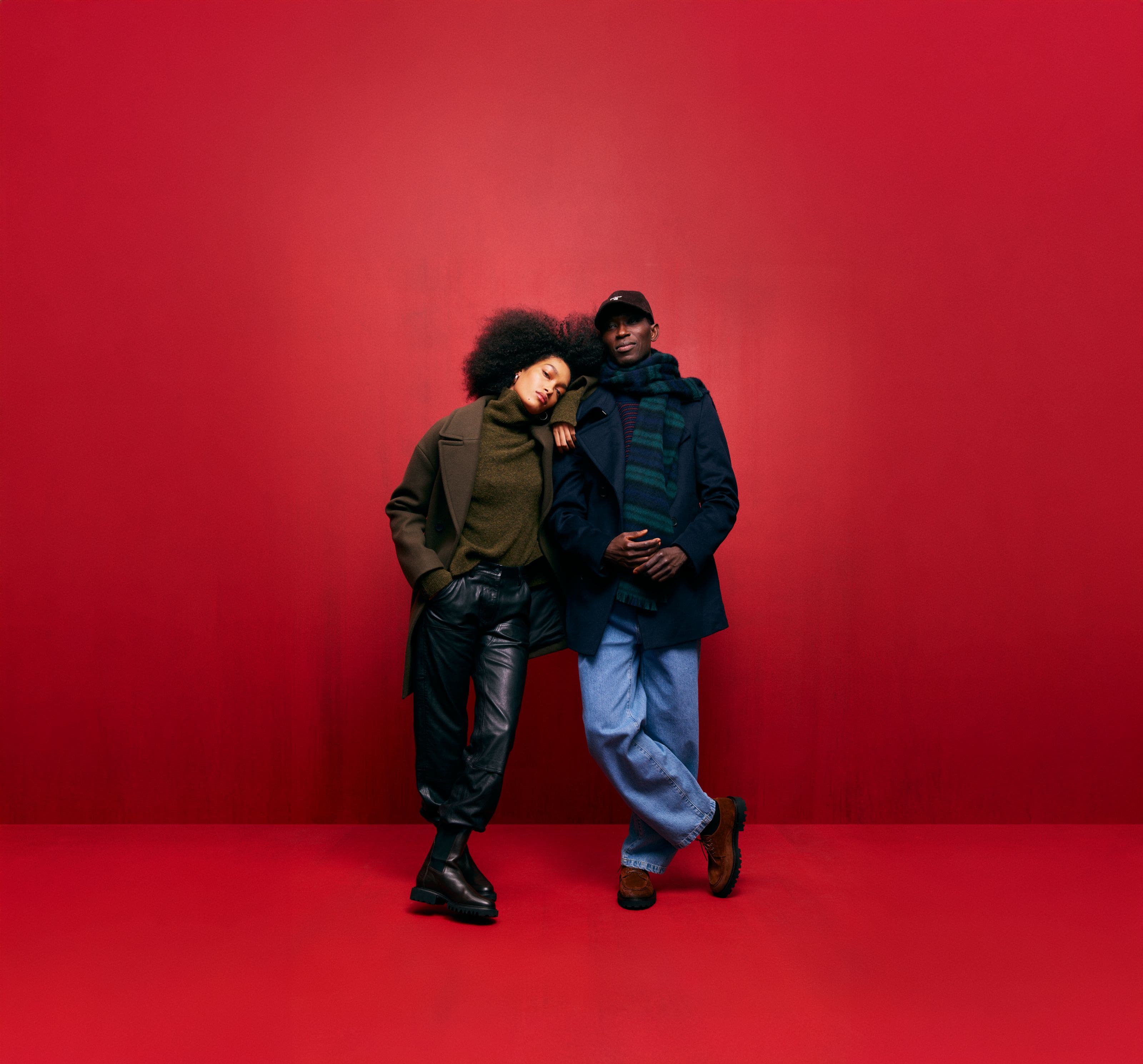 Woman and man wearing cold-weather looks.