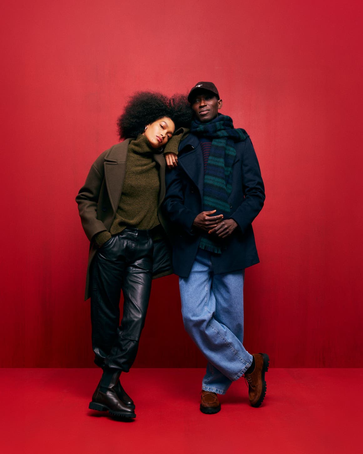 Woman and man wearing cold-weather looks.